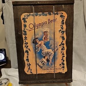 Vintage Olympia Beer Advertisement On Reclaimed Wood.